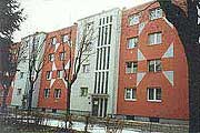 Red coloured housing block in Piotrków Trybunalski, Poland